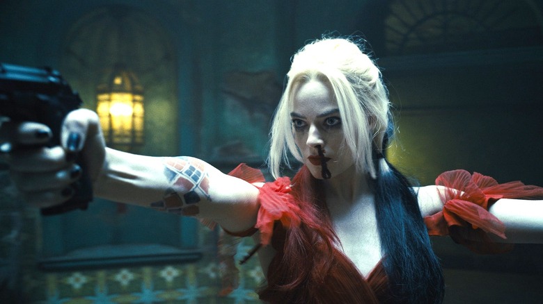 Harley Quinn holding gun