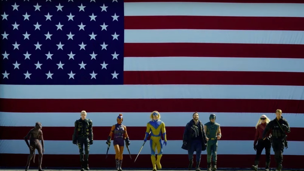 The Suicide Squad in front of the American flag