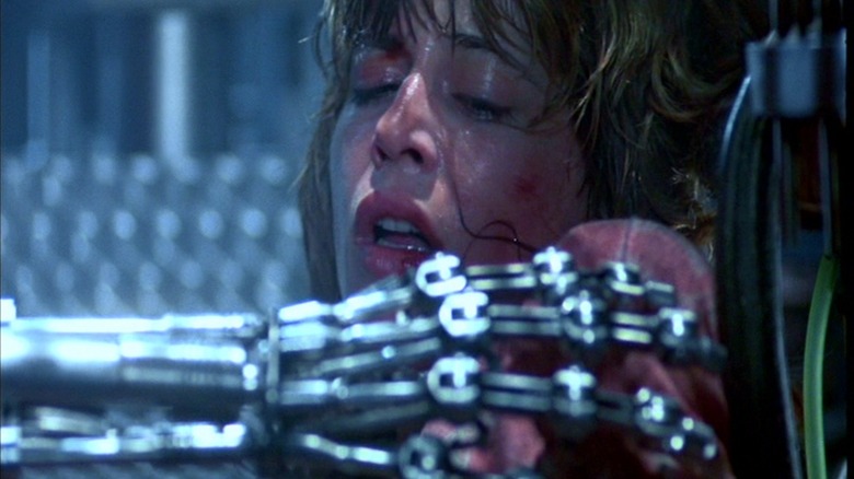 Terminator's hand reaching out for Sarah in The Terminator