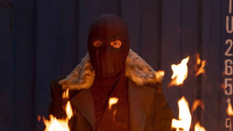 Baron Zemo staring through flames