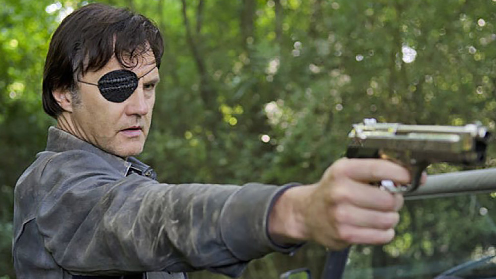 The Governor pointing gun