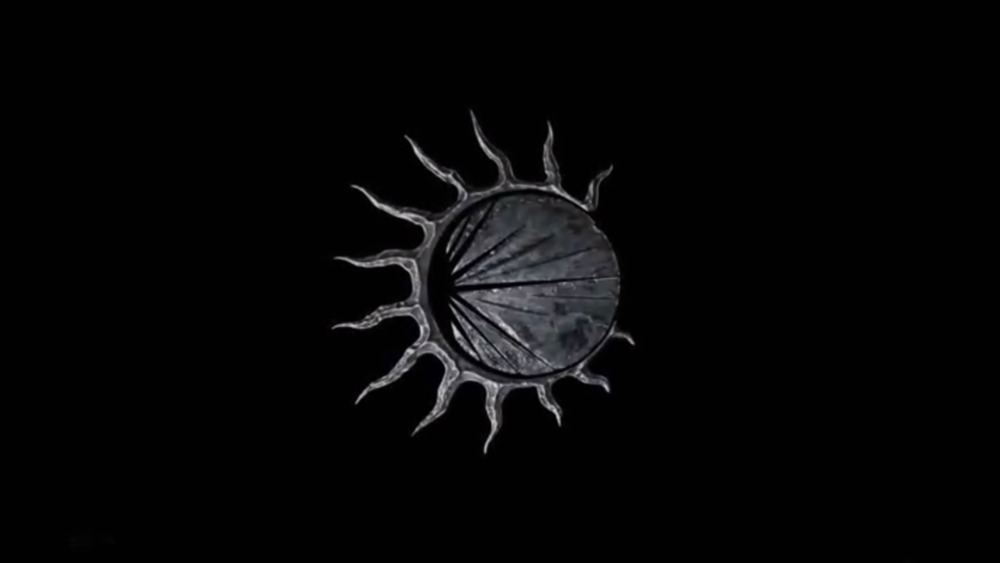 Renfri's black sun symbol