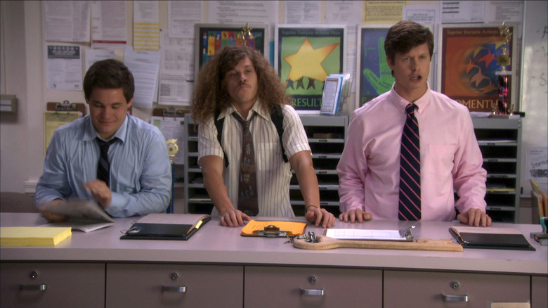 Blake, Adam, and Anders stand behind a counter