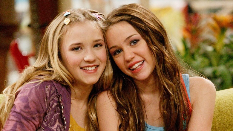 Miley Cyrus as Hannah Montana and Emily Osment as Lilly Truscott