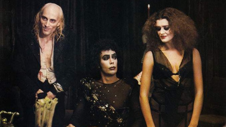 Riff Raff, Frank and Magenta in the dinner scene in The Rocky Horror Picture Show