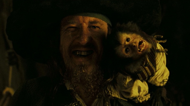 Captain Barbossa and his monkey return at the end of Dead Man's Chest