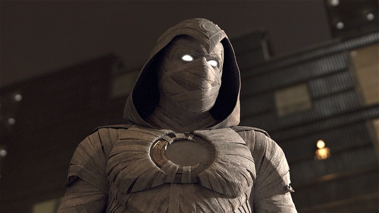 Moon Knight with his arms out