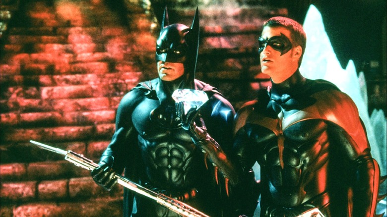 Batman and Robin standing together