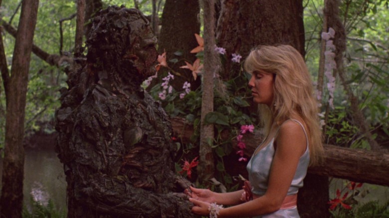 Swamp Thing and Abbie embracing