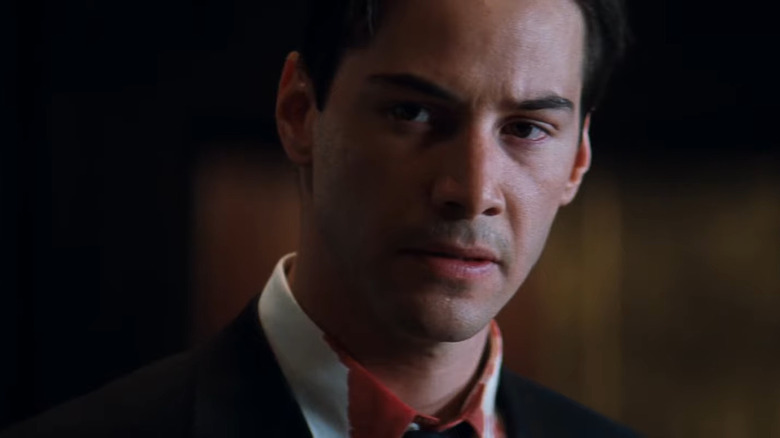 Keanu Reeves with blood on his collar