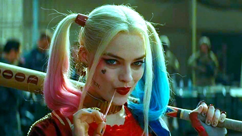 Harley Quinn chews gum