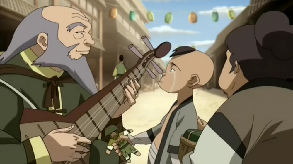 Iroh comforts a child in 'Tales of Ba Sing Se'