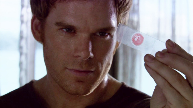 Dexter looks at blood slide