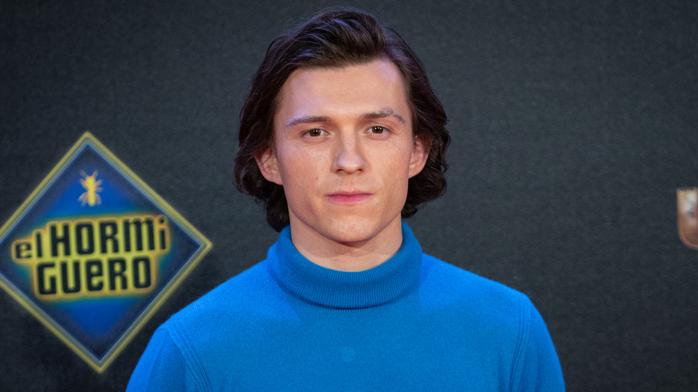 Tom Holland in blue turtleneck