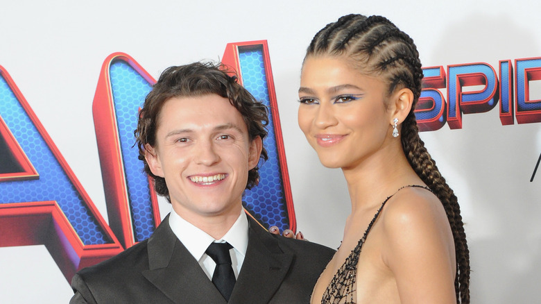 Tom Holland and Zendaya smiling