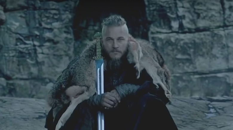 Ragnar Lothbrok holding sword in Vikings