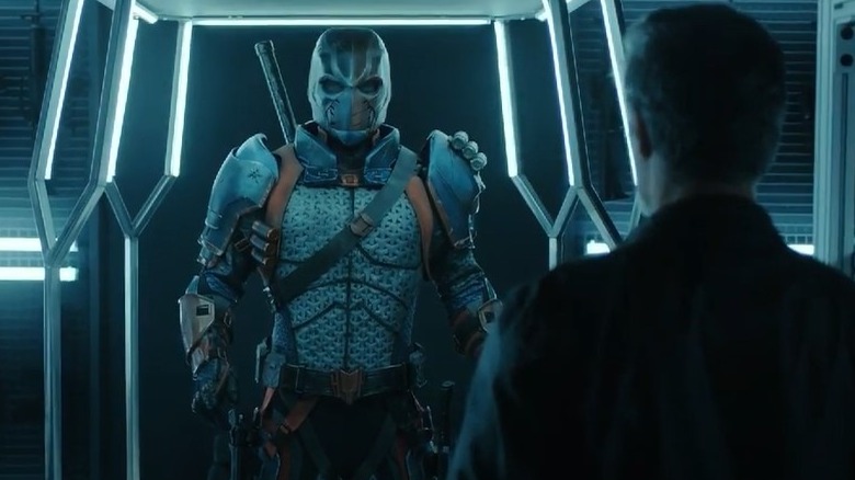 Esai Morales looking at Deathstroke armor