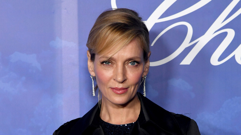 Uma Thurman sporting updo hairstyle