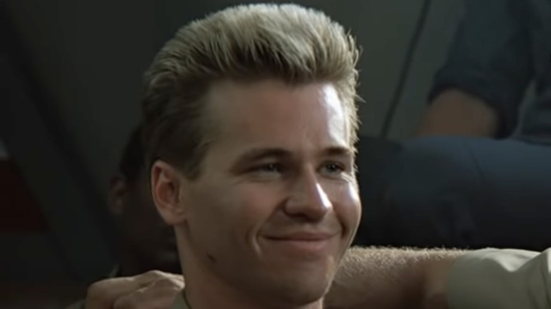 Val Kilmer smiling in Top Gun