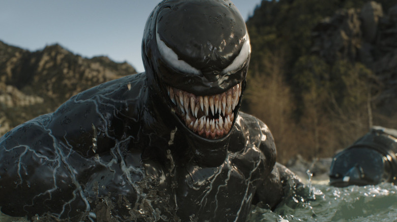 Venom swims in the rapids in Venom: The Last Dance