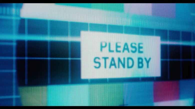 Shimmery TV screen that says "Please stand by"