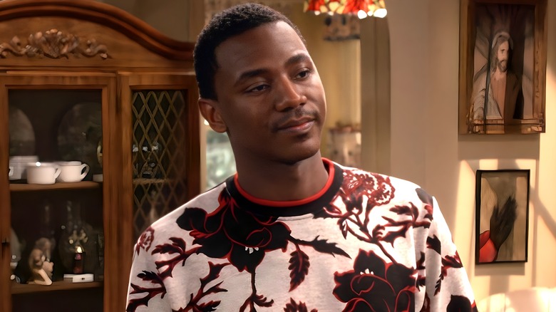 Jerrod Carmichael patterned shirt looking to right