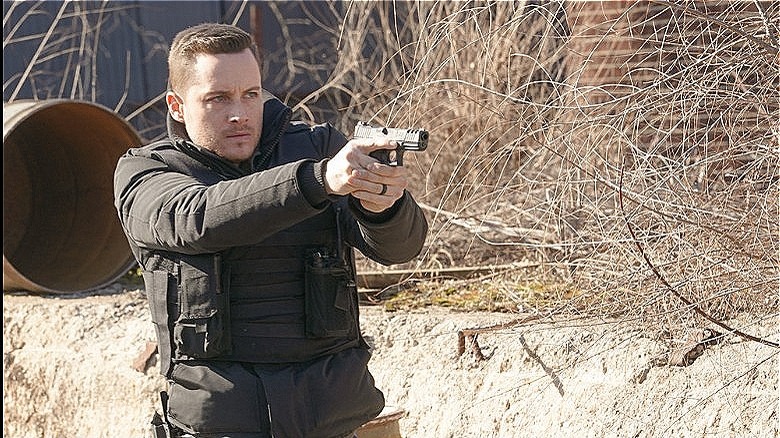 Jay Halstead pointing a gun