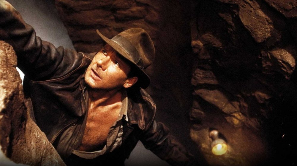 Indiana Jones contemplating mortality on the precipice