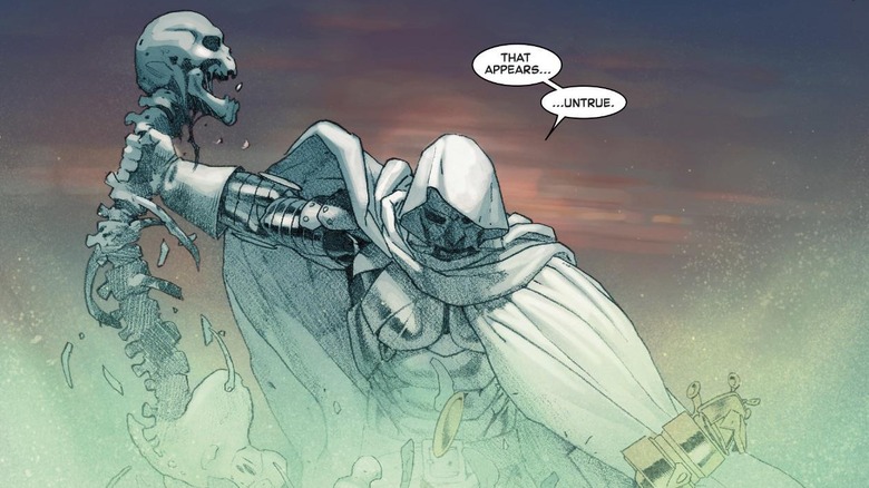 Doom holding Thanos' skeleton in the comics