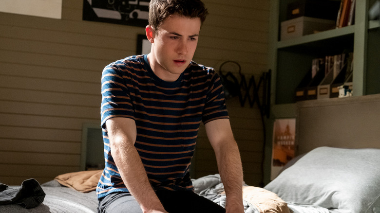 13 Reasons Why Clay sits on bed
