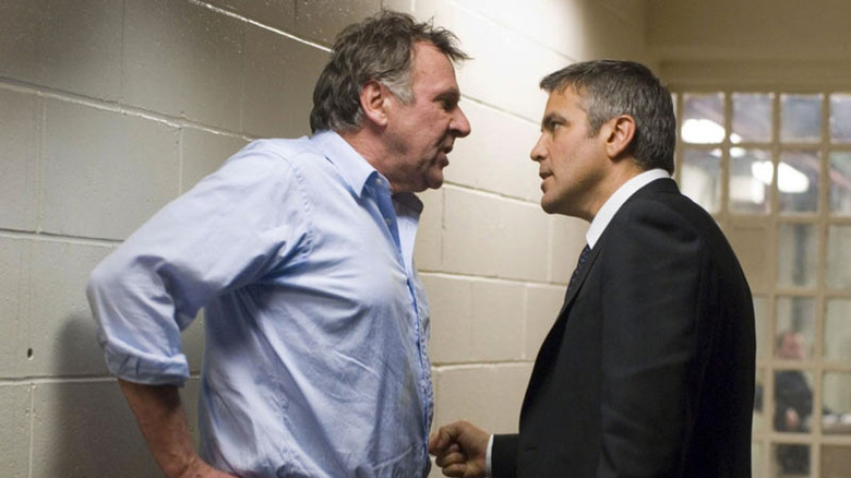 Tom Wilkinson and George Clooney in jail