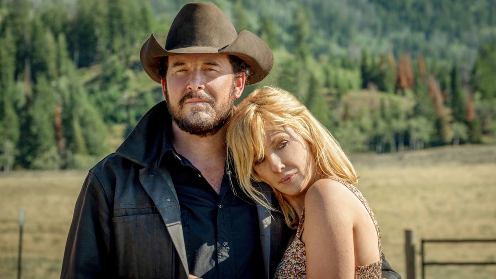 Rip (Cole Hauser) and Beth hug on Yellowstone