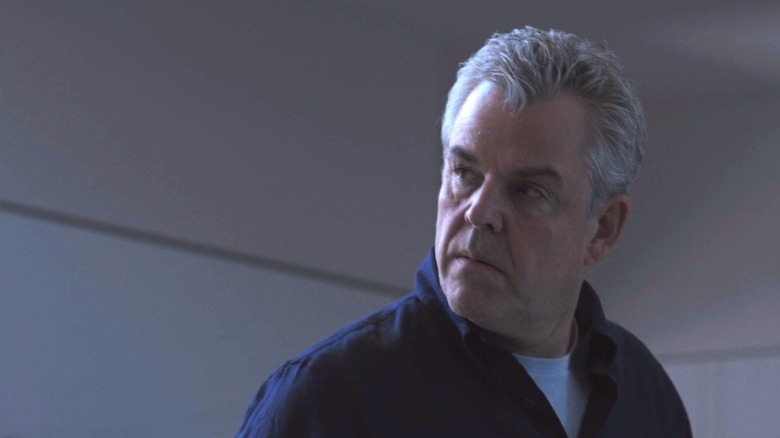 Danny Huston frowning