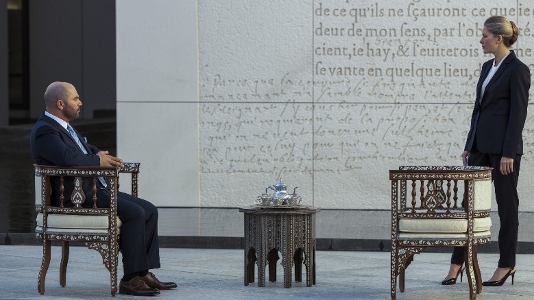 Rovach Alimov sitting down