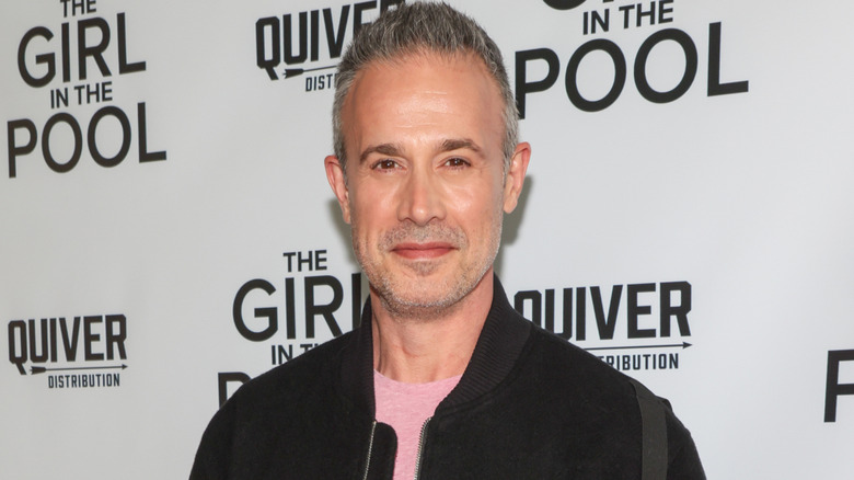 Freddie Prinze Jr. smiling for photographers at a movie premiere in Beverly Hills in July 2024