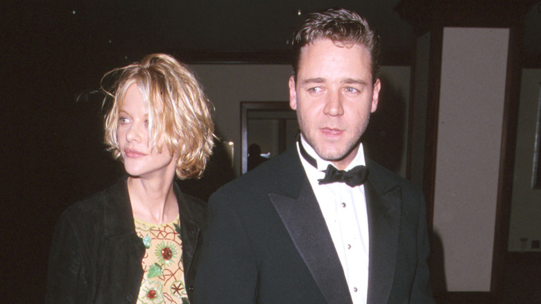 Meg Ryan walks with Russell Crowe