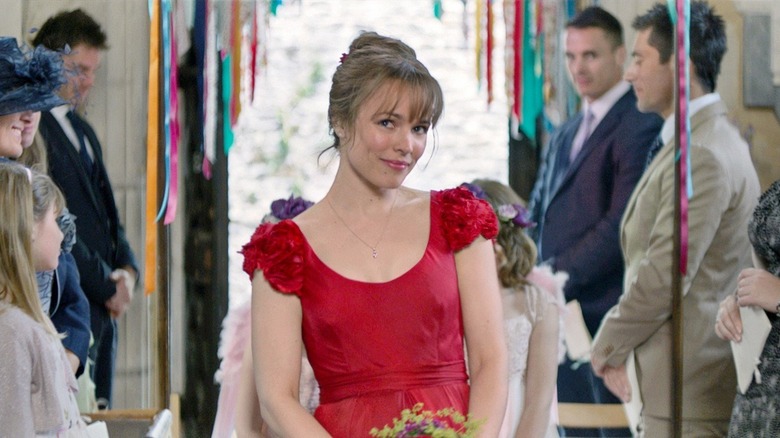 Mary wearing a red wedding dress