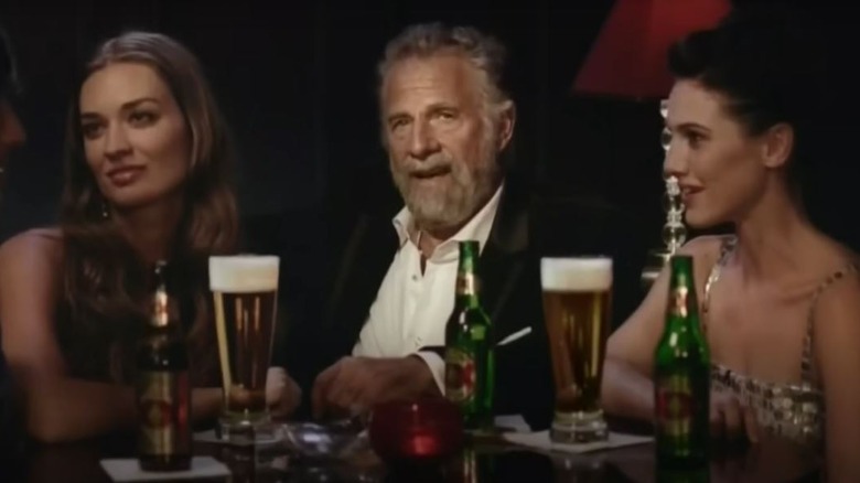 Most Interesting Man sitting at table