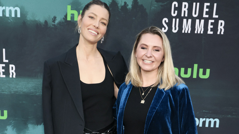 Jessica Biel and Beverley Mitchell standing