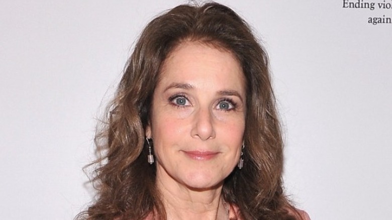 Debra Winger closed mouth smile