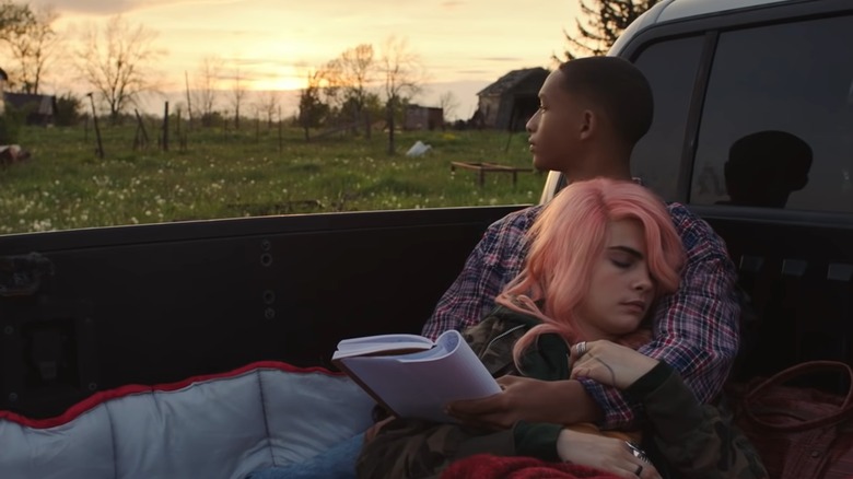 Daryn and Isabelle lie in truck bed in Life After You (2022)