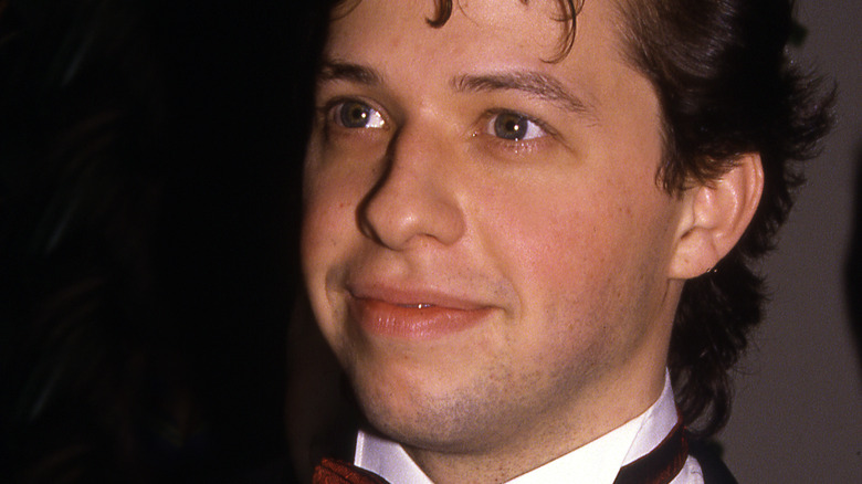 Young Jon Cryer arriving at celebrity event