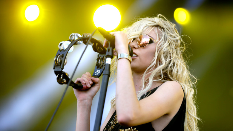 Taylor Momsen with tambourine