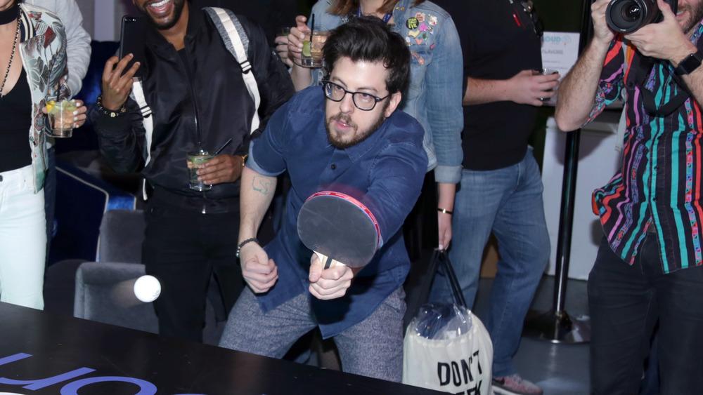 Christopher Mintz-Plasse playing ping pong