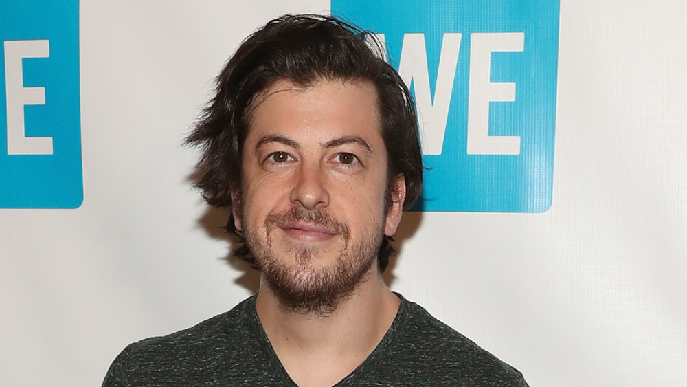 Christopher Mintz-Plasse smiles