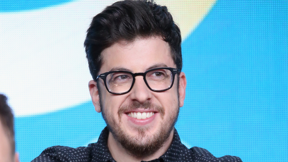 Christopher Mintz-Plasse grins