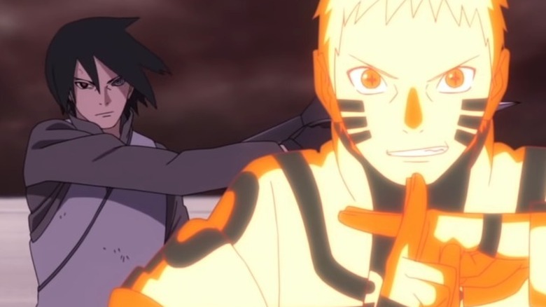 Naruto and Sasuke fighting Momoshiki