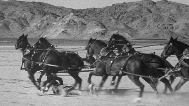 Horses drag Yakima Canutt