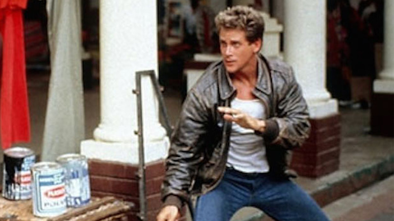 Michael Dudikoff strikes a pose