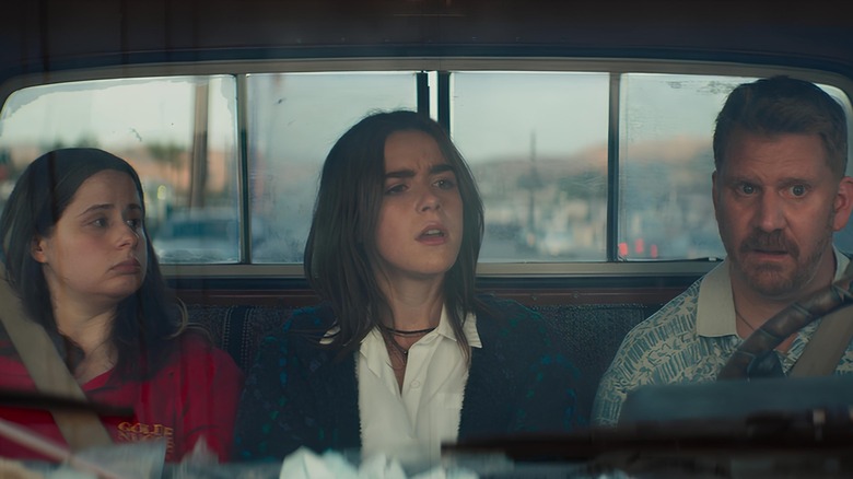 Sharon, Bea, and Derek riding in car